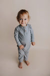 Experience ultimate comfort with our soft ribbed cotton onesie, perfect for both lounging and adventures.