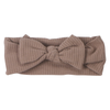 Buttery soft and stretchy knotted headbands, hand-tied for your little girl's comfort and adorable style.