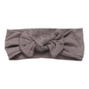 Our handmade, stretchy knotted headbands are crafted with love, ensuring a perfect fit for your little girl.